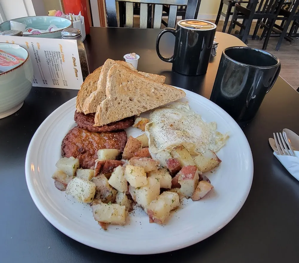 Eggs Any Style Sausage Patties and Home Fries with Toast
